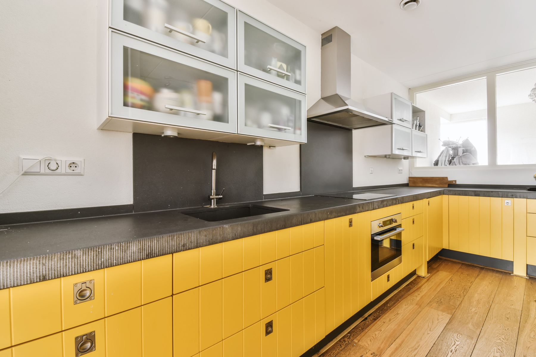 Pretty Kitchen with Yellow Kitchen Unit and Hanging Cabinets
